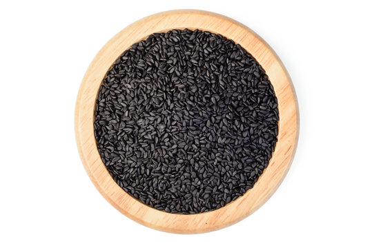 black sesame in the wooden plate, (large depth of field, taken with tilt shift lens)
