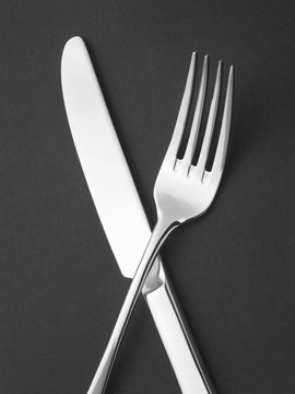 cutlery on black - Stock Image