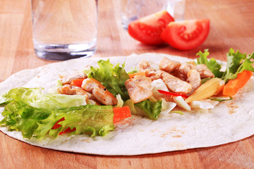 Preparing chicken wrap sandwich