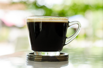 Hot coffee on the table in the cafe