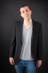 Obraz premium Handsome man doing different expressions in different sets of clothes: love