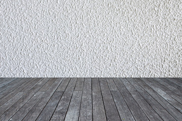 white cement wall background on wood floor