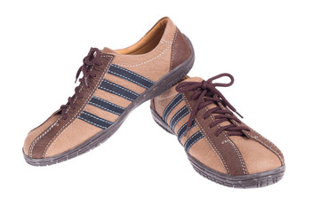 Man's leather brown shoes isolated on white background