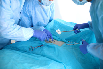 A team of surgeons at work in the operating room