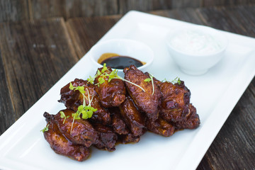 Delicious chicken wings on the grill