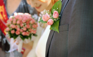 Wedding groom buttonhole-flower with roses 
