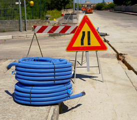 roll of corrugated conduit for microtrench in urban areas. Presence of signals for the execution of...