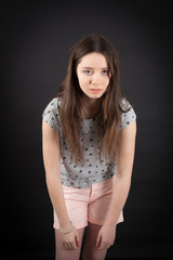 beautiful woman doing different expressions in different sets of clothes: tired