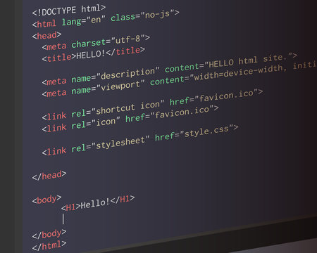 Website HTML code on the monitor screen.