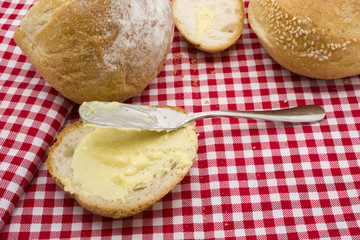 Sliced of round bread with butter