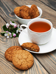Cup of tea with oatmeal cookies