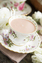 Obraz na płótnie Canvas Spicy pink tea in beautiful cup