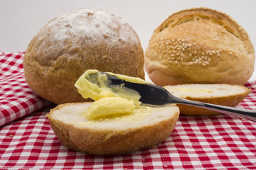 Sliced of round bread with butter