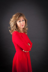 Fototapeta premium Beautiful woman doing different expressions in different sets of clothes: arms crossed