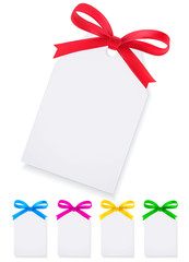 White tags isolated on white background with ribbon