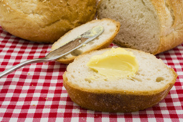 Sliced of round bread with butter