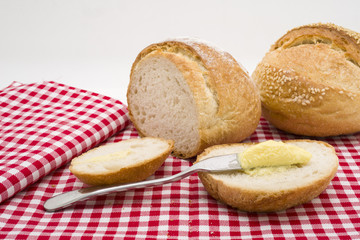 Sliced of round bread with butter