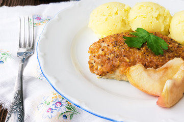 Baked chicken roll with apples, selective focus