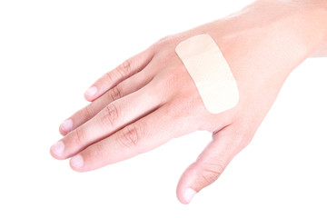 close up of adhesive plaster on male hand