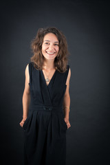 Fototapeta premium Beautiful woman doing different expressions in different sets of clothes: smile