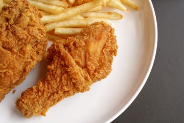 Fried chicken leg with french fries
