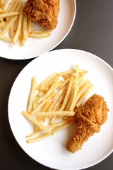 Fried chicken leg with french fries
