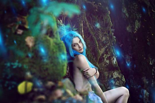 Ethereal nymph with surreal forest lights