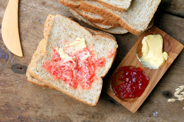 Slice toast whole wheat bread with strawberry jam