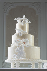 Fototapeta na wymiar white wedding cake with decoratio