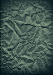 Green crumpled paper texture