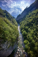 Fototapeta na wymiar mountains with river deep below