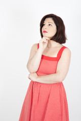 Beautiful woman doing different expressions in different sets of clothes: thinking