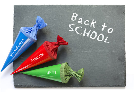 school cones on a  chartboard with message good luck