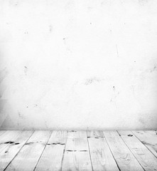 White room with white wood floor