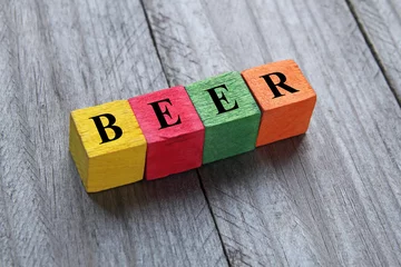 Foto op Plexiglas word beer on colorful wooden cubes © chrupka