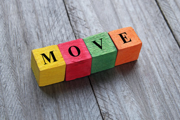 word move on colorful wooden cubes