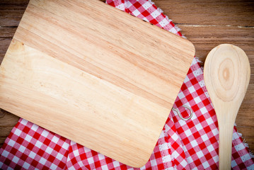 Blank wood Surface and wooden spoons, top view