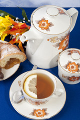 Tea with lemon croissant