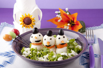 mozzarella cheese in the shape of a snowman