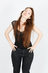 Fototapeta premium Beautiful businesswoman doing different expressions in different sets of clothes: posing
