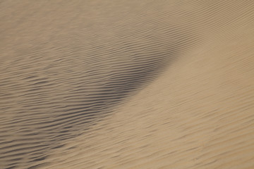 Waves of sand texture on a sand dune in Fayoum desert, Egypt
