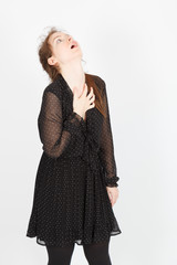 Beautiful businesswoman doing different expressions in different sets of clothes: heart attack