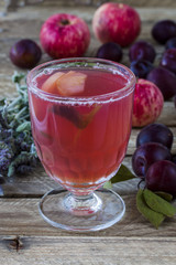 Sweet drink made from apples, plums and mint