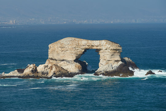 La Portada. A natural arch in the Pacific Ocean near Antofagasta in northern Chile. The arch is a national monument and home to many hundreds of seabirds.