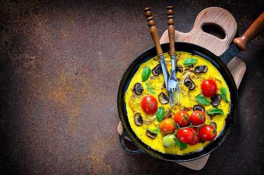 Omelet or frittata with tomatoes