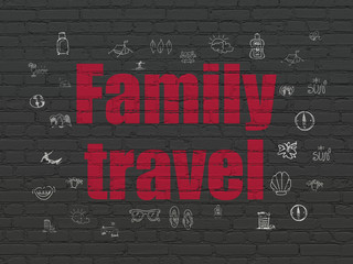 Vacation concept: Family Travel on wall background