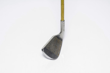 Golf clubs, through hard work on white background.
