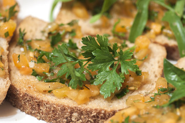 Italian bruschetta with yellow tomatoes