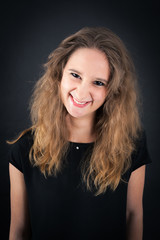 Naklejka premium Beautiful woman doing different expressions in different sets of clothes: smile