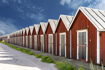 Row of traditional boathouses